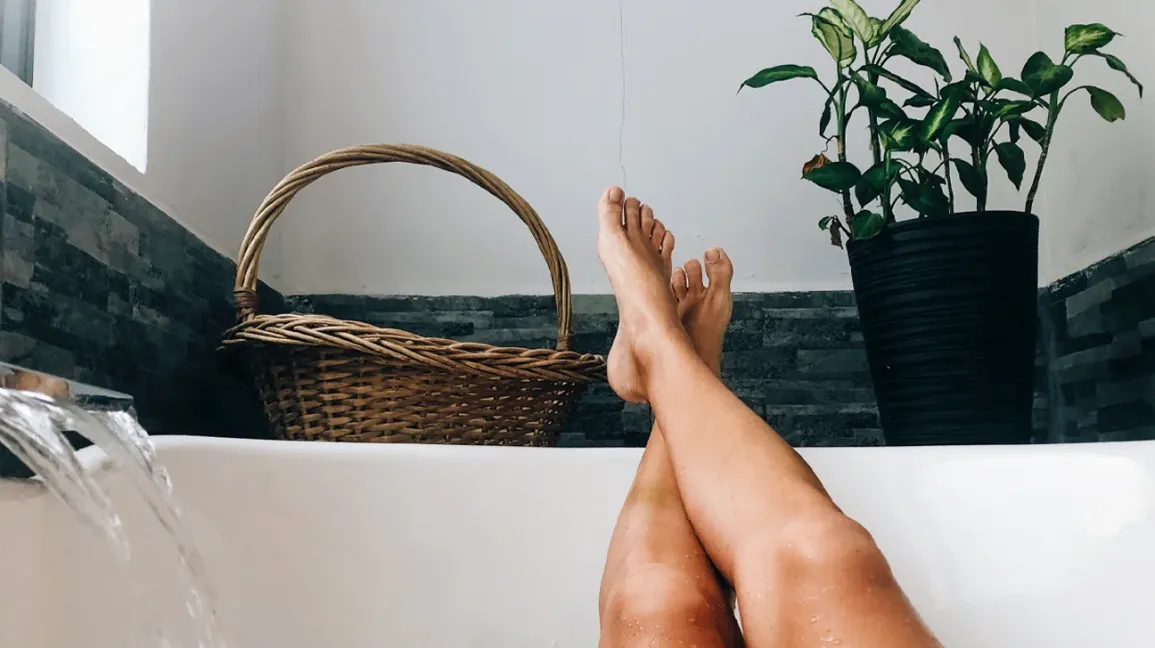 Woman In The Bathtub 1296x728 header .jpg